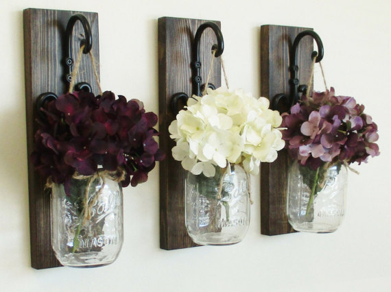 barattoli fiori muro